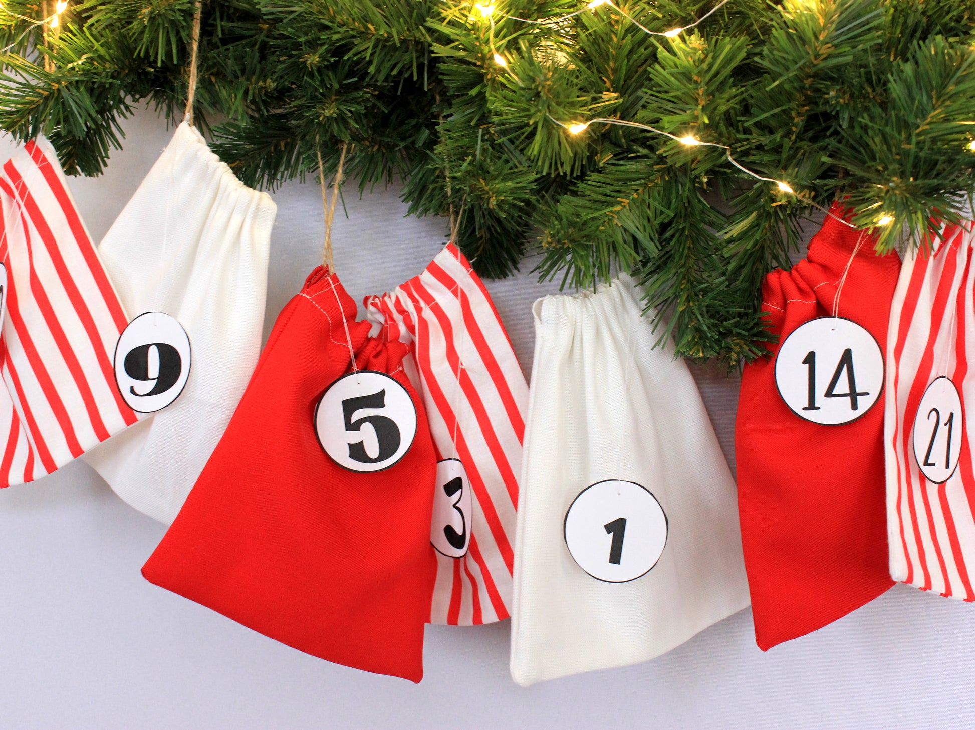 Advent calendar bags hung on wall – ready for holiday countdown