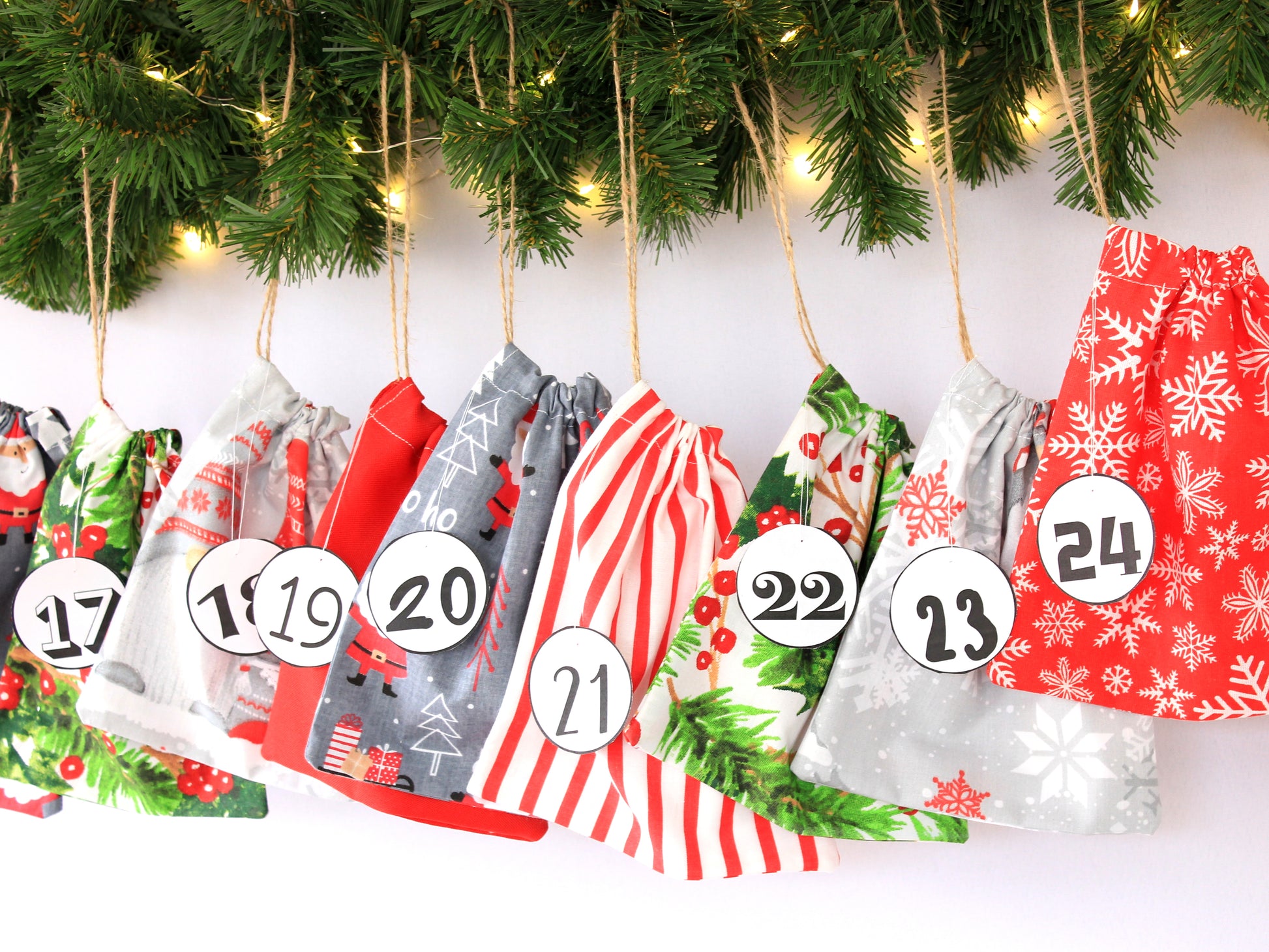Advent calendar bags hung on wall – ready for holiday countdown