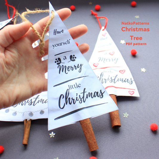 Christmas tree with cinnamon sticks, featuring festive text - easy holiday craft by NatkoPatterns