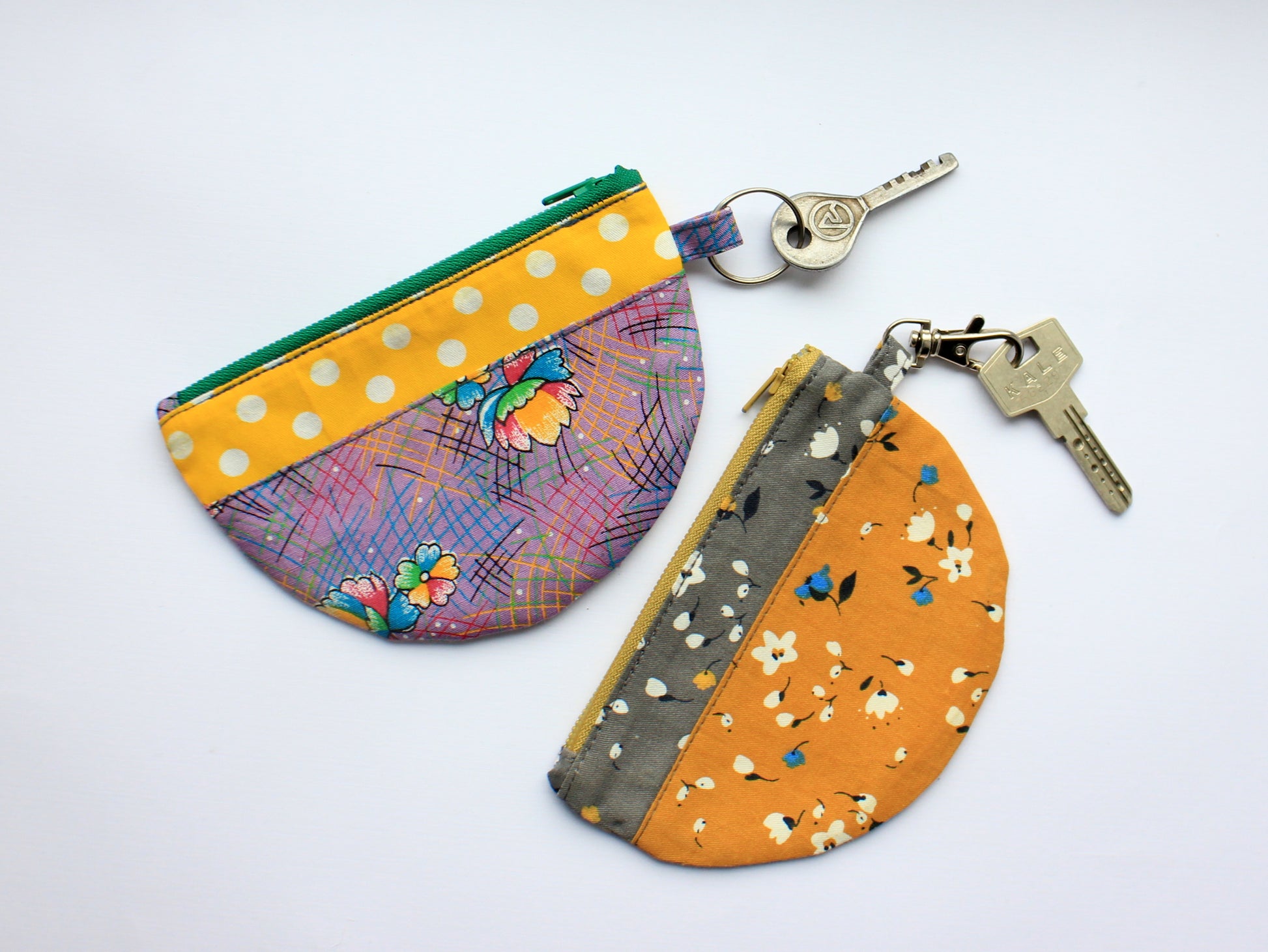 Two colorful fabric pouches with keys, handmade using sewing pattern by NatkoPatterns