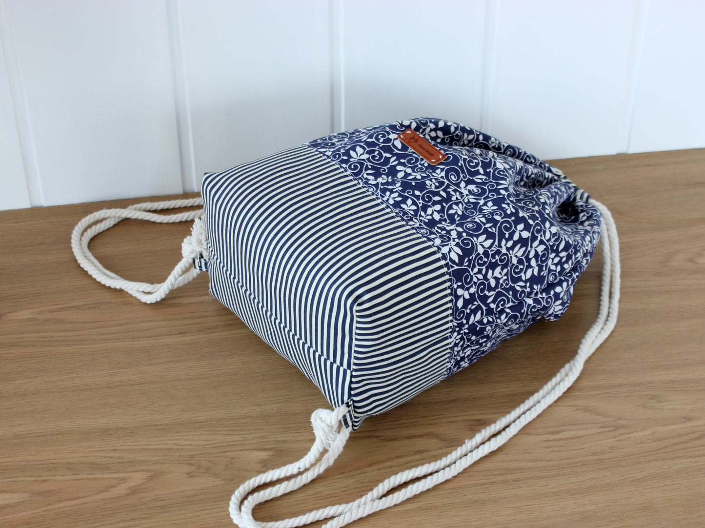 Back view of handmade drawstring backpack – sewing project for beginners by NatkoPatterns
