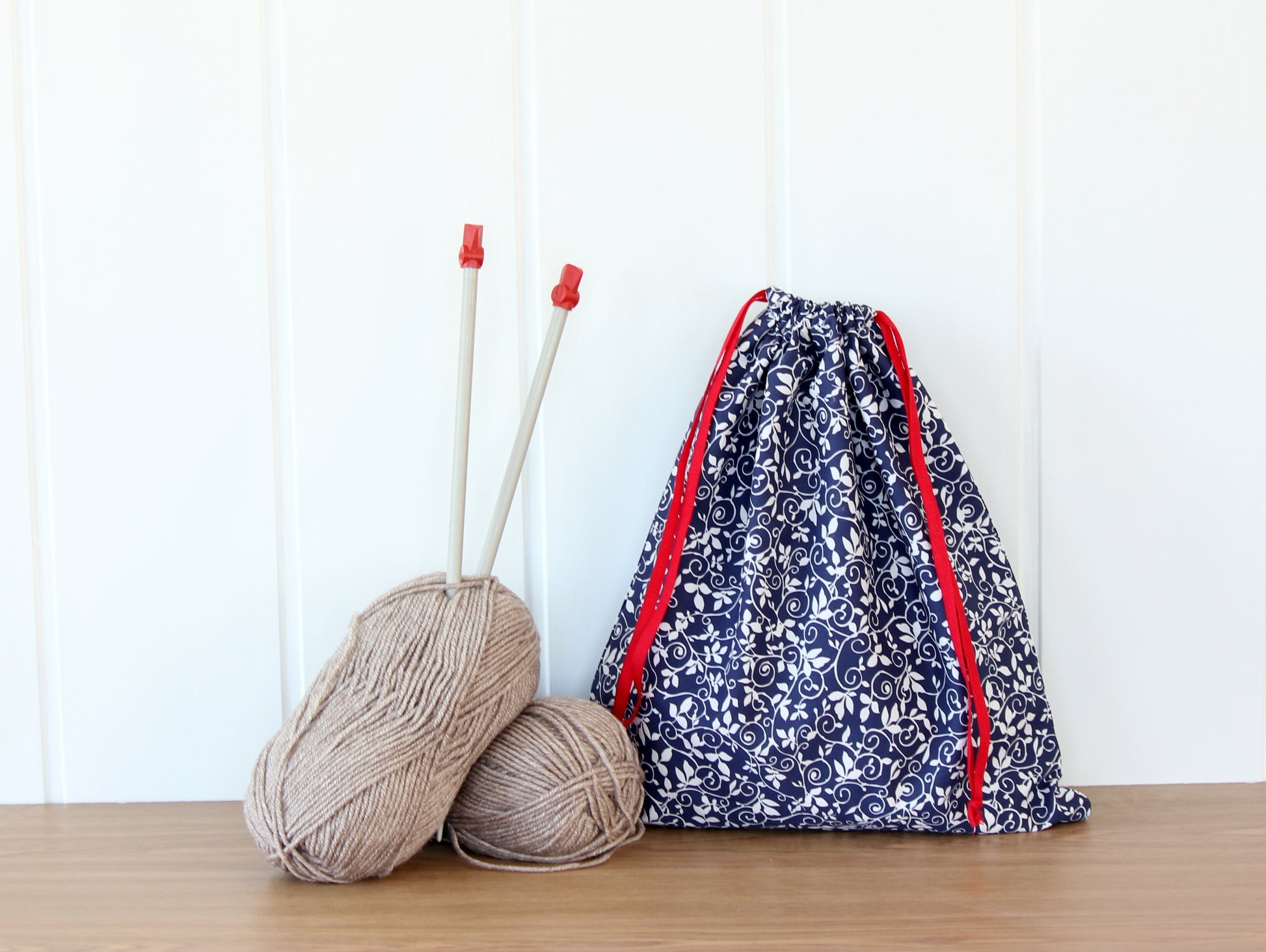 Drawstring bag with yarn and knitting needles - sewing pattern from NatkoPatterns