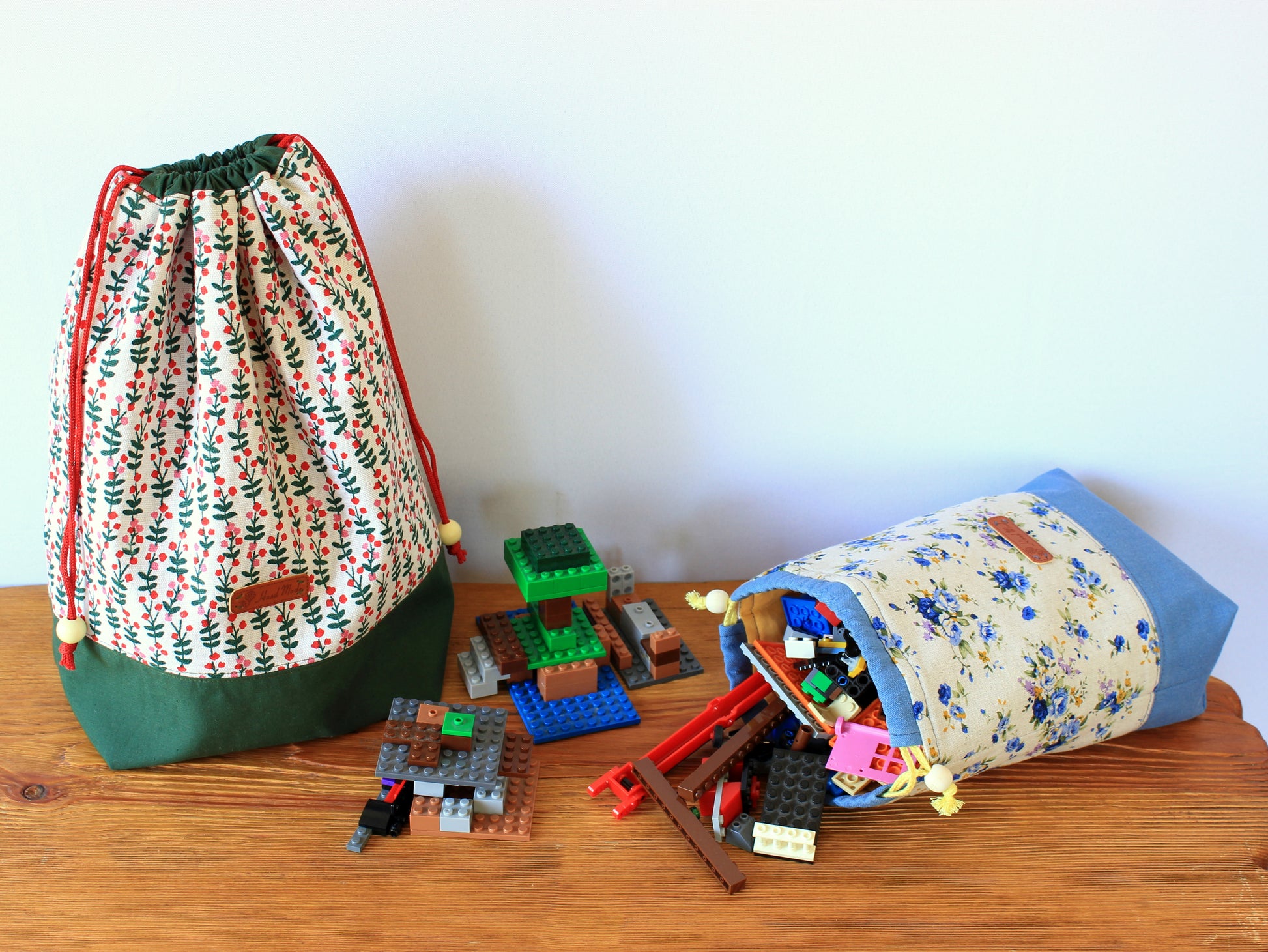 Drawstring bag with toys, handmade using sewing pattern by NatkoPatterns