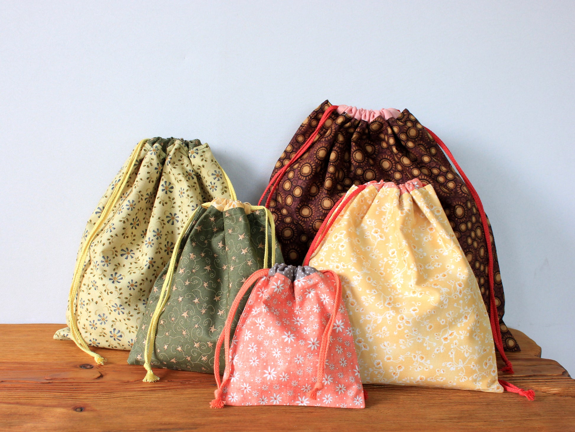 Collection of drawstring bags in various sizes – printable PDF sewing template by NatkoPatterns