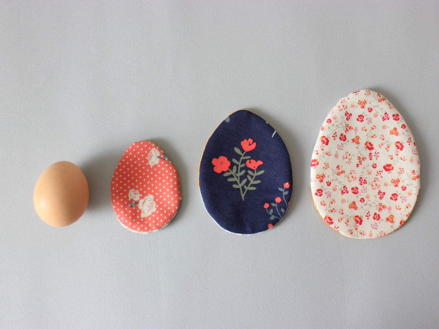 size competition with a real egg and a fabric egg sewing pattern PDF by NatkoPatterns