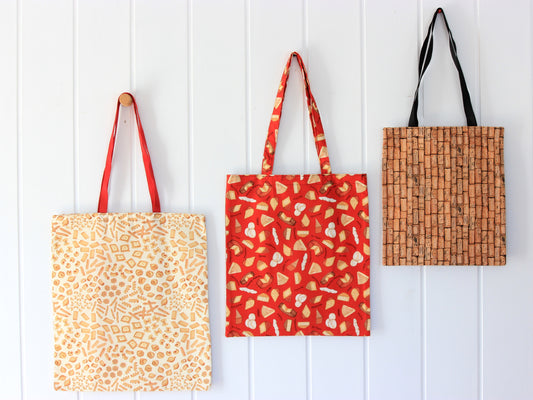 Three tote bags of different sizes
