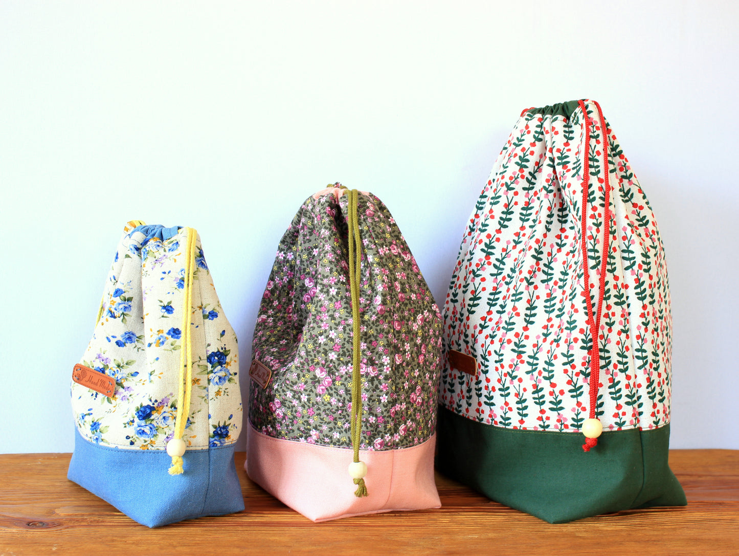 Side view of handmade drawstring bags – sewing project by NatkoPatterns