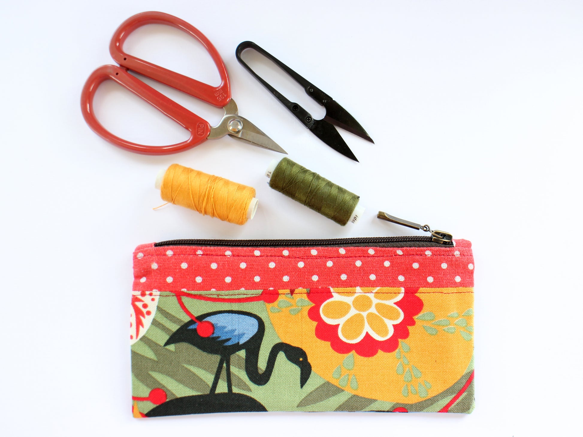 Handmade pouch with sewing tools including scissors and thread - sewing tutorial by NatkoPatterns