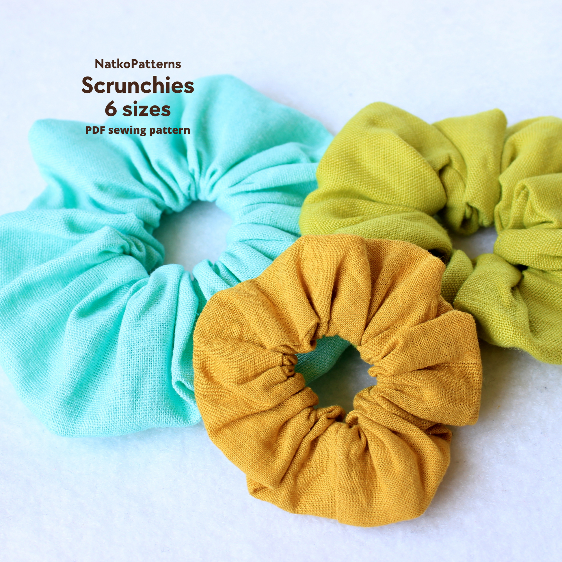 Three colorful scrunchies  with text about a PDF sewing pattern by NatkoPatterns