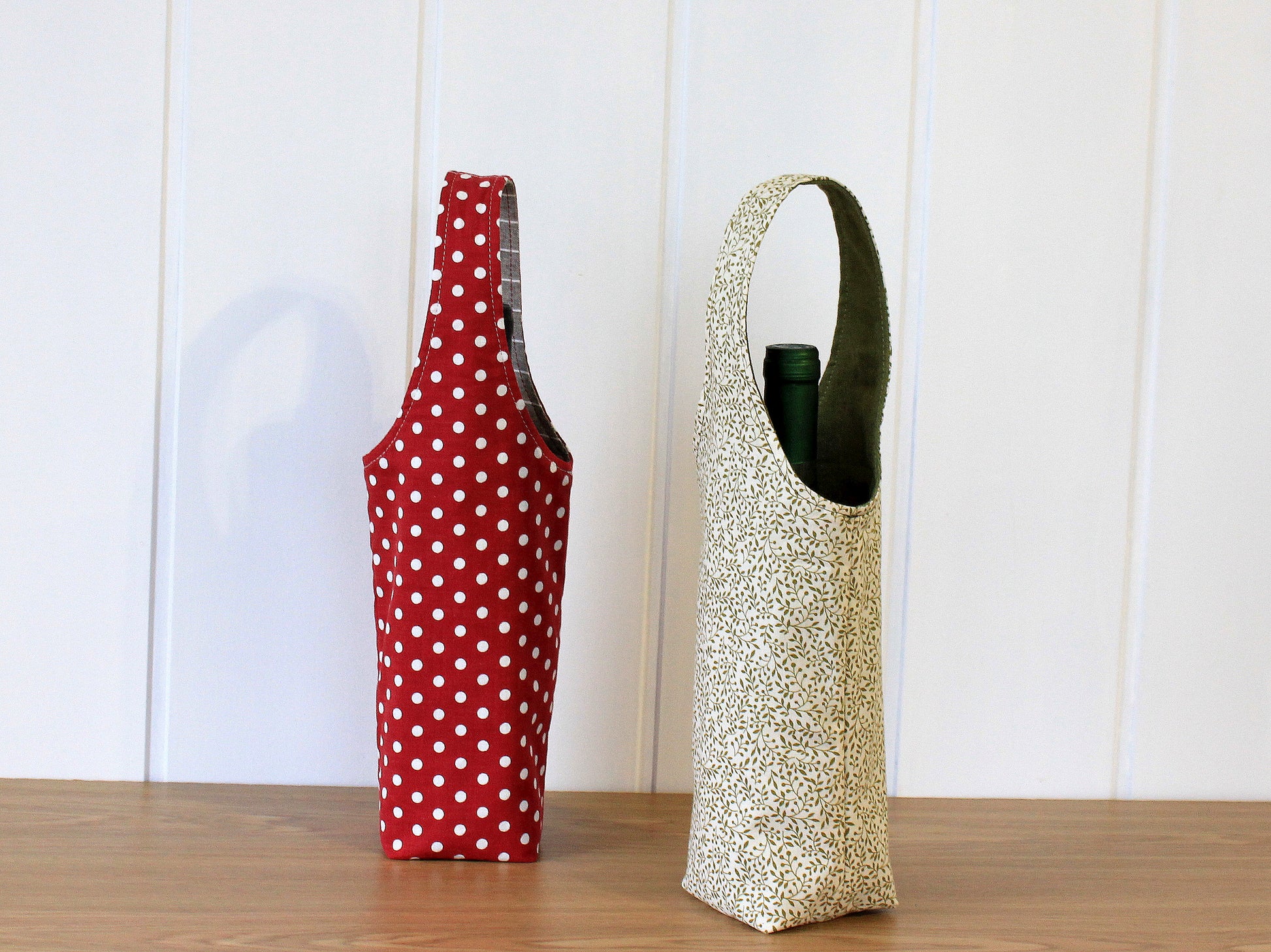 Bottle bag holding a wine bottle – sewing pattern by NatkoPatterns